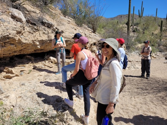 student smiling at a field trip to Saguaro National Park